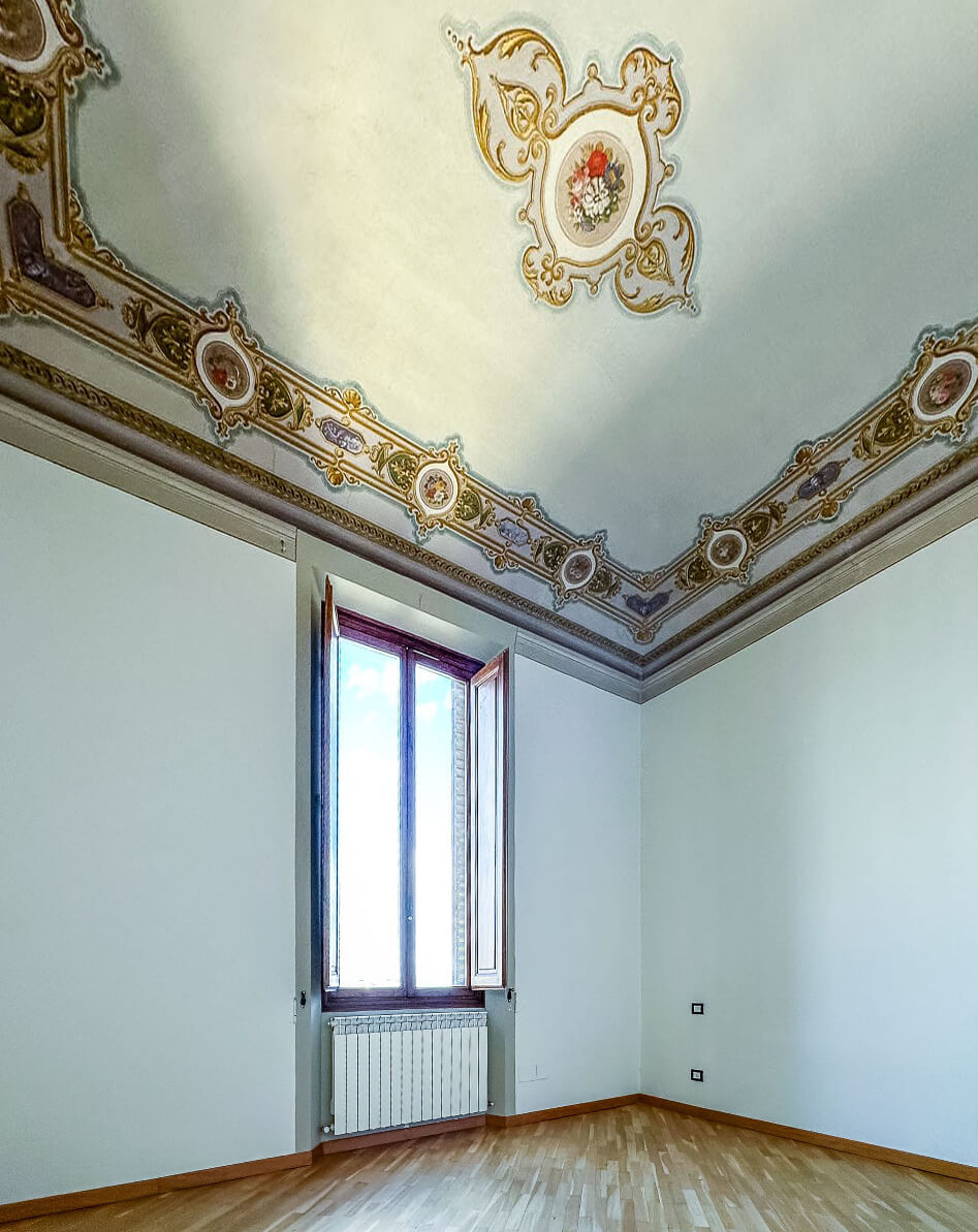 Preserved frescoed ceiling — historic palazzo restoration