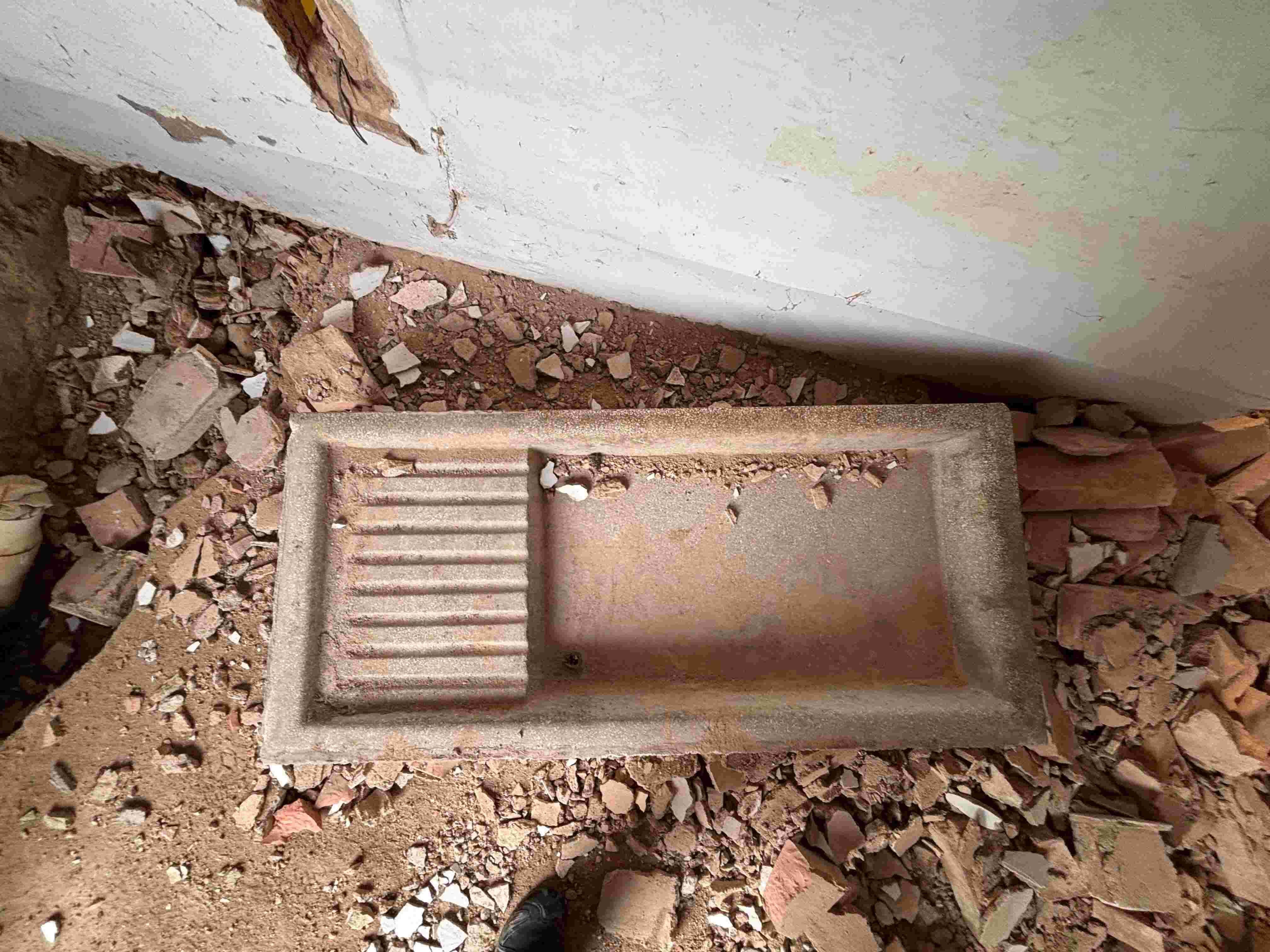 Antique stone sink recovered during restoration